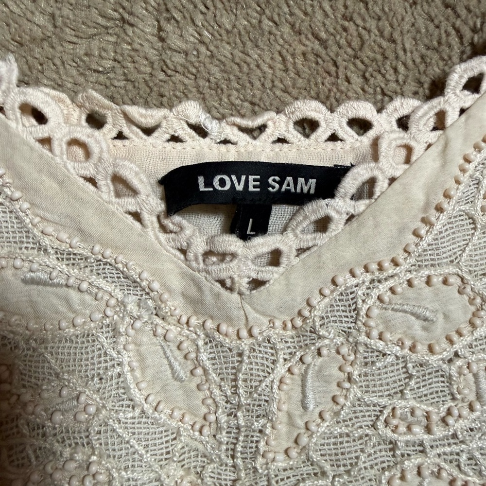 Love Sam lace peplum camisole top.
cream-colored
Pit to pit 19 1/2 inches - Picture 3 of 5